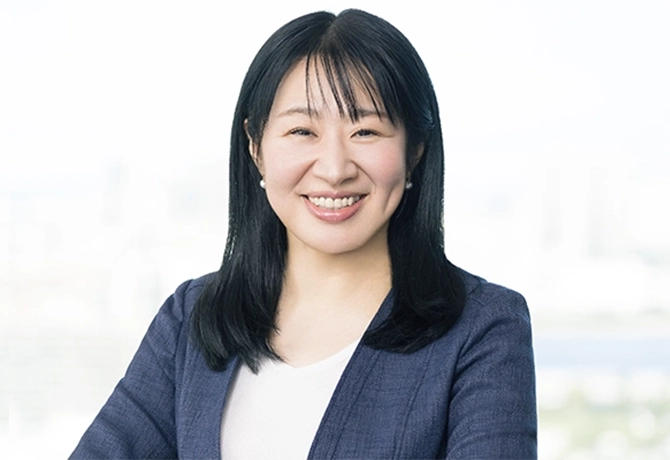 越 直美